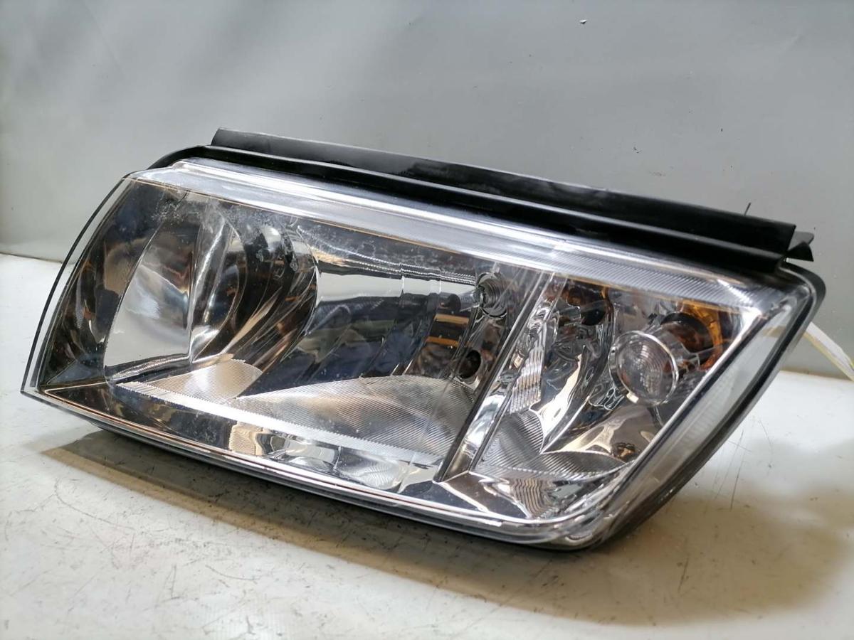 Skoda Fabia 6Y Scheinwerfer links Halogen Chrom Hintergrund Hersteller TYC Bj.2002